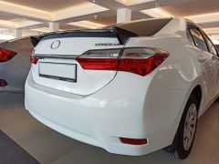 COROLLA 2014-2018 IÇIN UYUMLU SPOILER-TRD GENIS KENAR (PIANO BLACK)