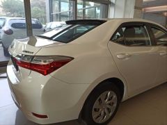 COROLLA 2014-2018 IÇIN UYUMLU CAM ÜSTÜ SPOILER  (BOYASIZ)